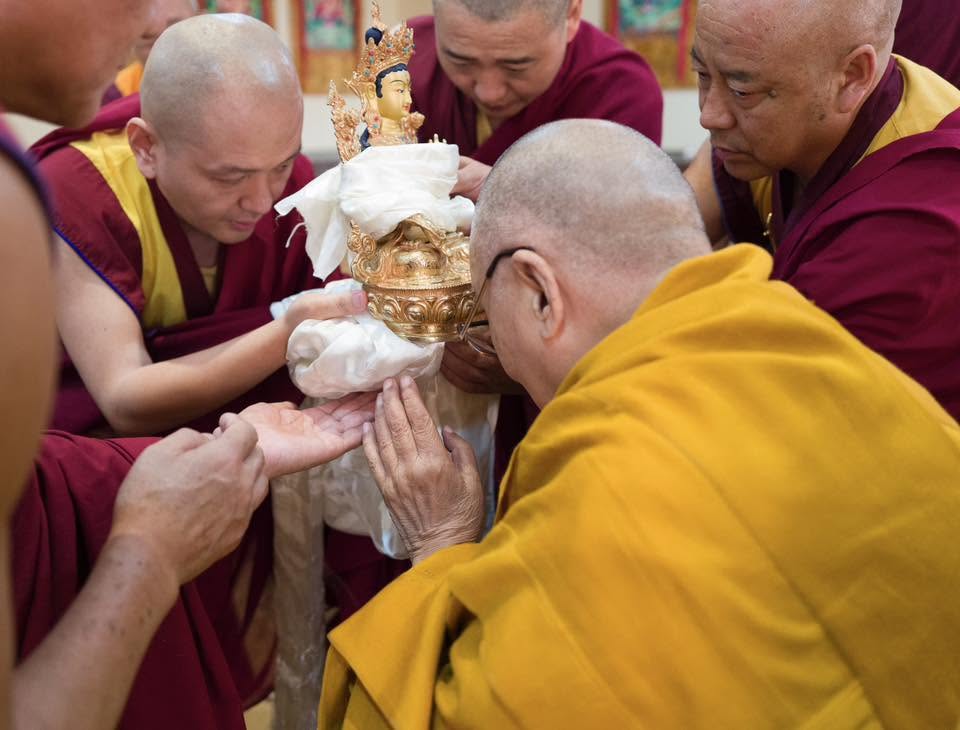 H.E. offering Mandala of three jewels to His Holiness the 14th Dalai Lama with supplication to live long for the benefit of Buddha Dharma and  all sentient beings.